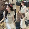 dam-bau-di-tiec-tracy-cham-bi-co-sen-no-den-01